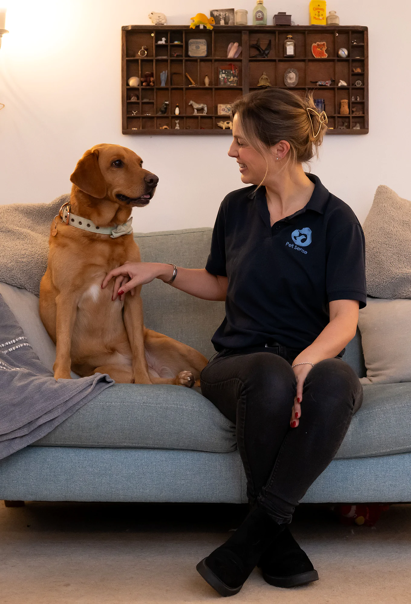 Behaviourist Rosie Bescoby with an older dog, a Golden Labrador called Jaffar