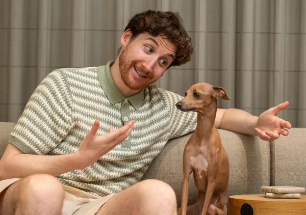 James Hoyles chatting to his dog, Trevor the Iggy