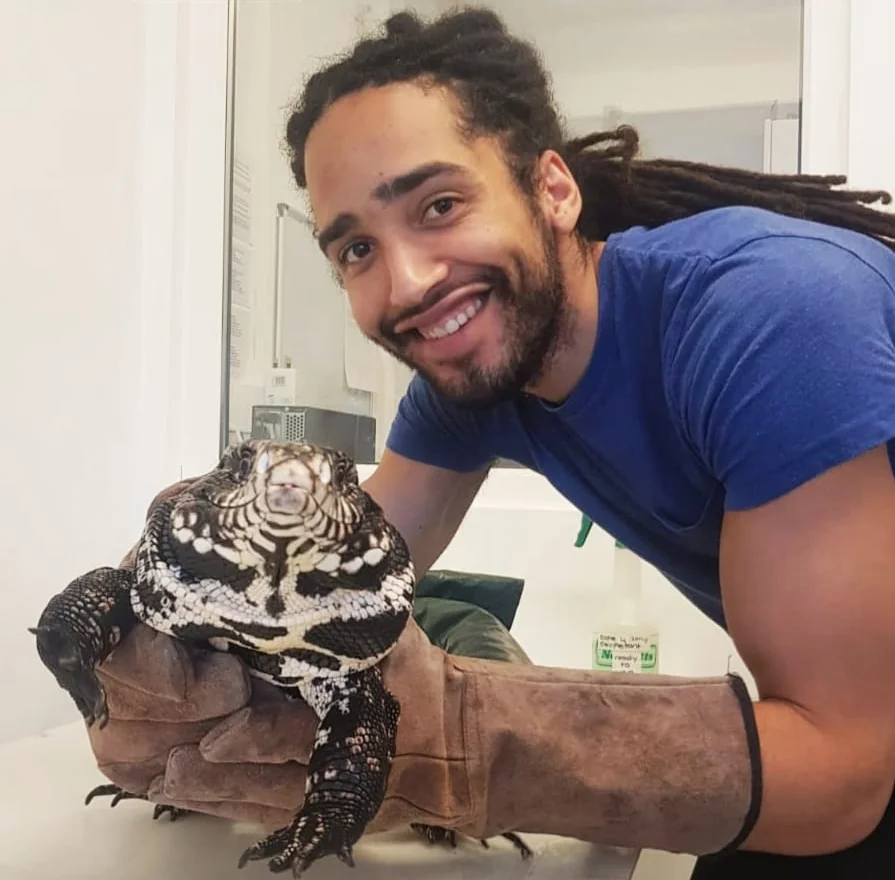 Dr Fabian Rivers holding a cool reptile